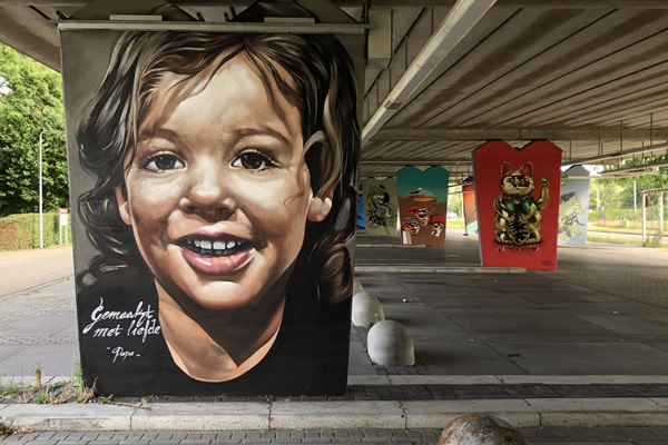 Mural of a little boy made by the father